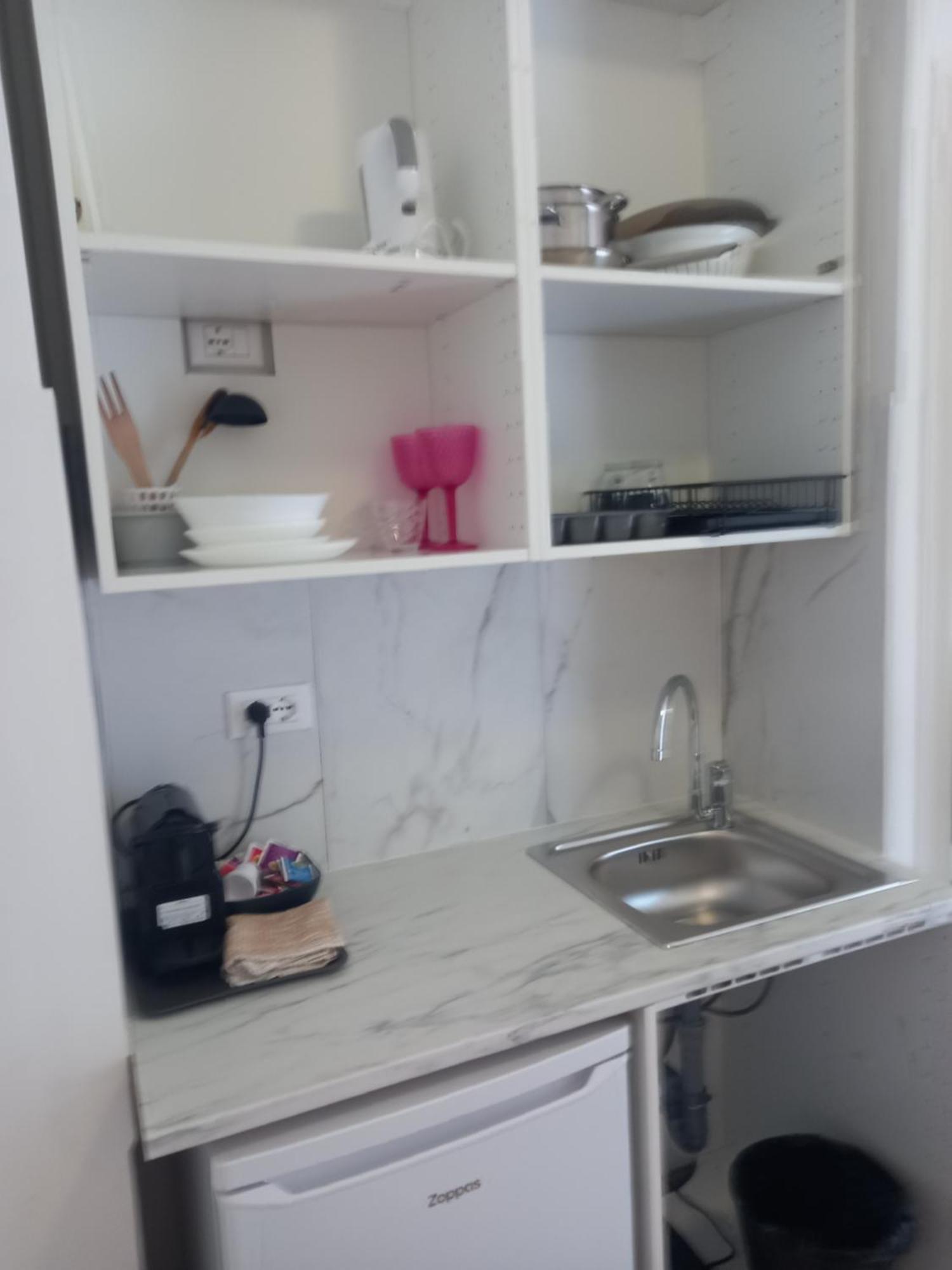 Minihouselarissa Diverona Bagian luar foto