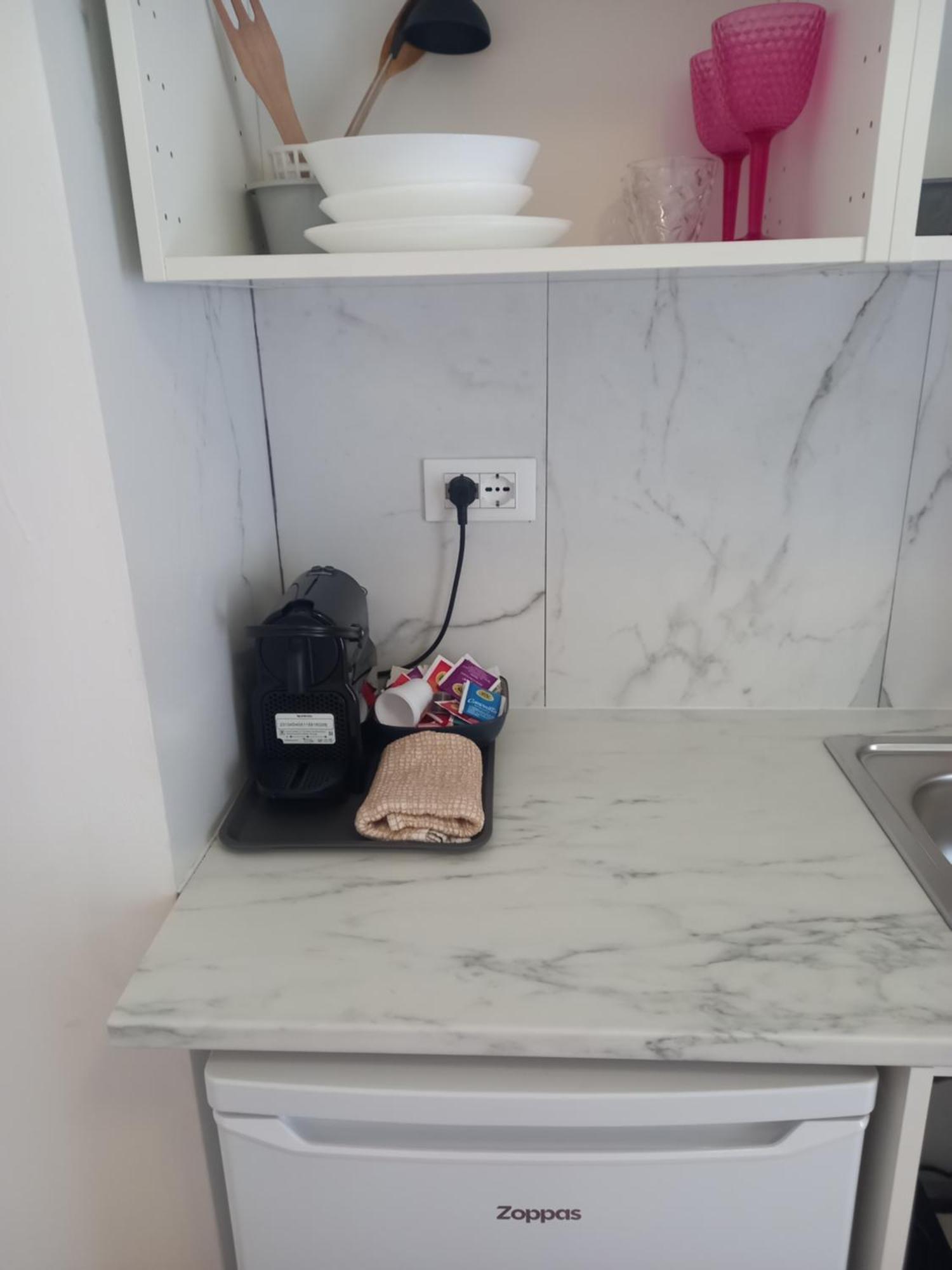 Minihouselarissa Diverona Bagian luar foto